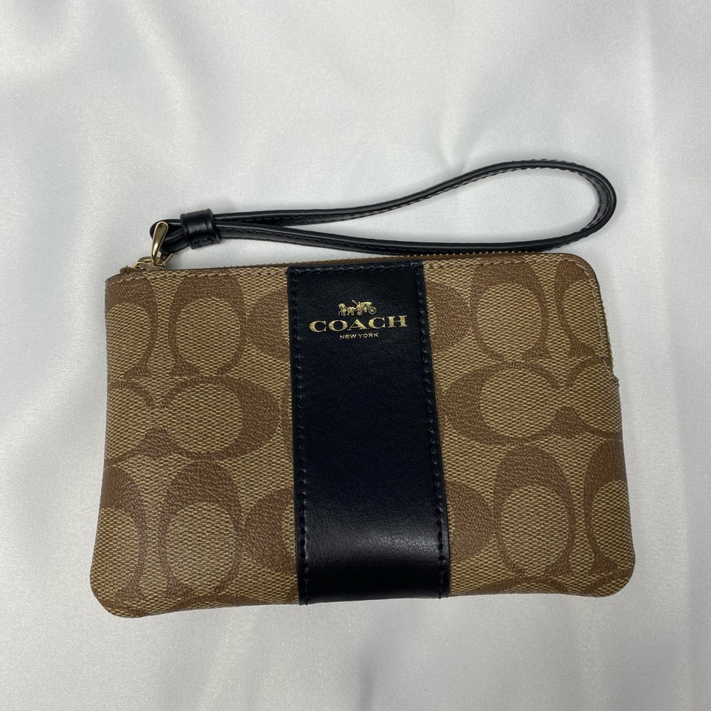Coach Wristlet in signature white Canvas